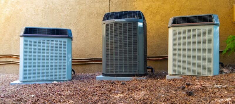 Three outdoor AC units side by side.