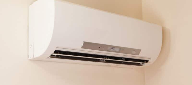 closeup of a ductless mini split system positioned on a wall