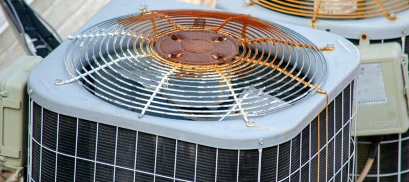 closeup of a dirty and rusted outdoor hvac machine
